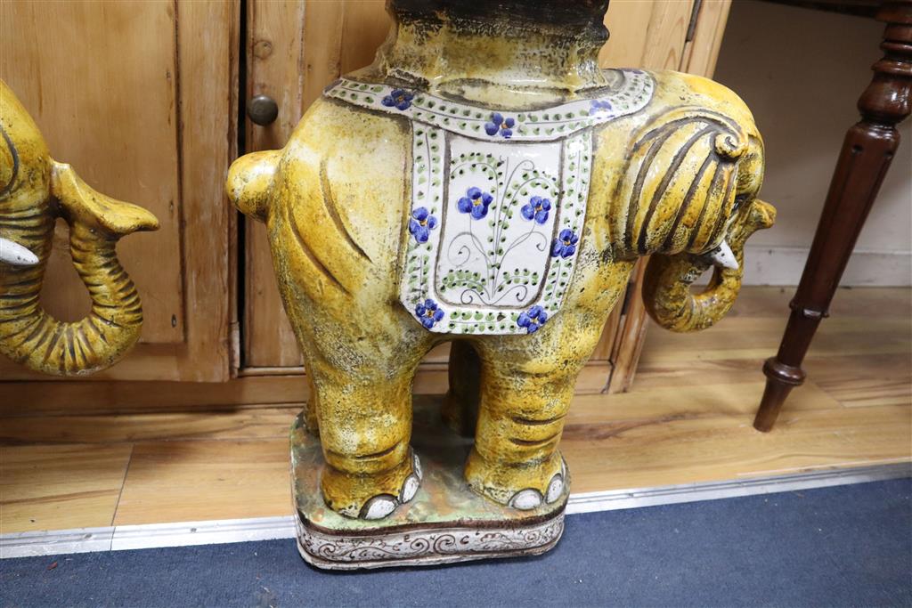 A pair of terracotta elephant garden seats